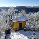 "Gartenhaus mit Winterlandschaft"