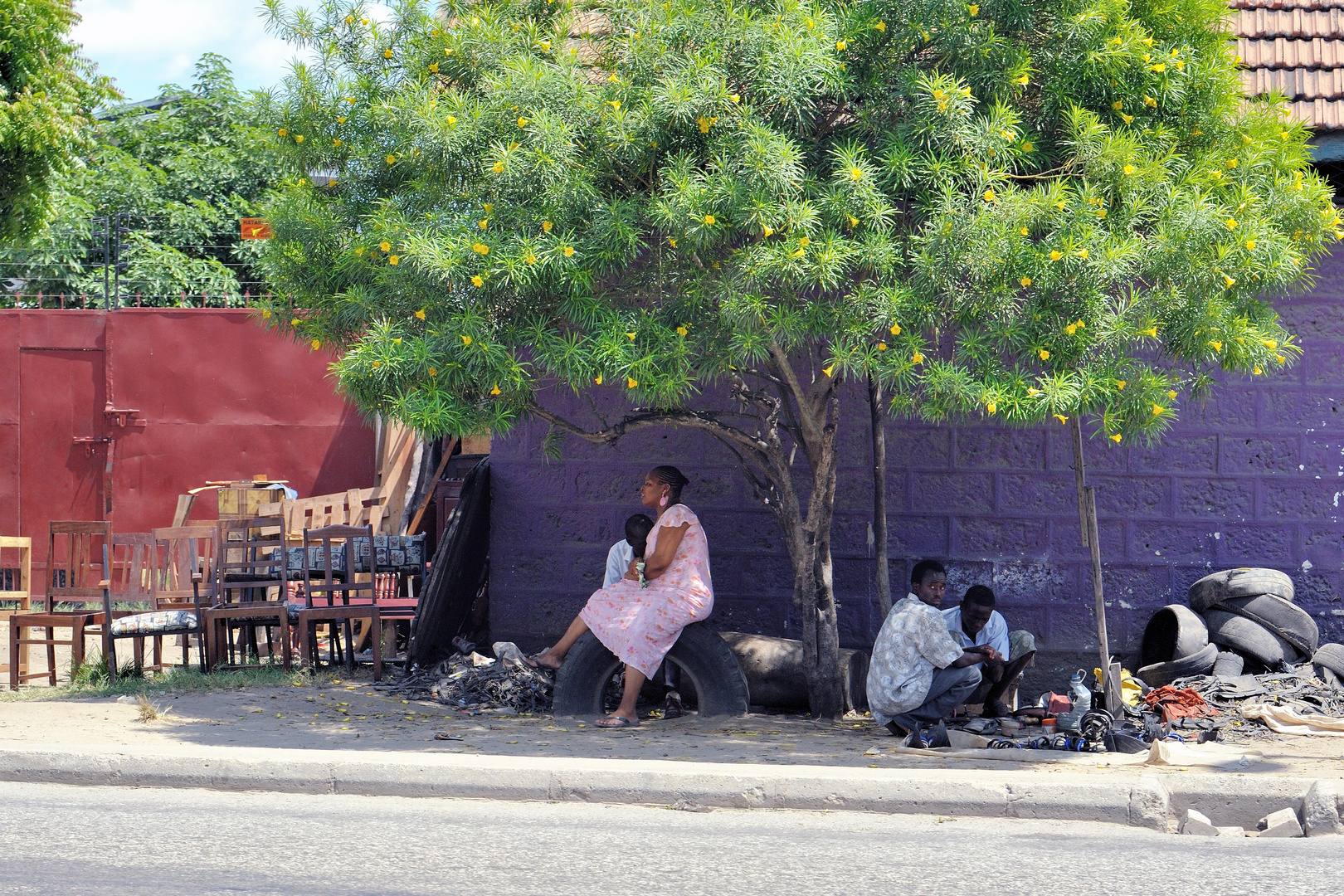 gathering under a tree, Ukunda, Kenya