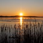 Gefrorener See mit Wasserloch