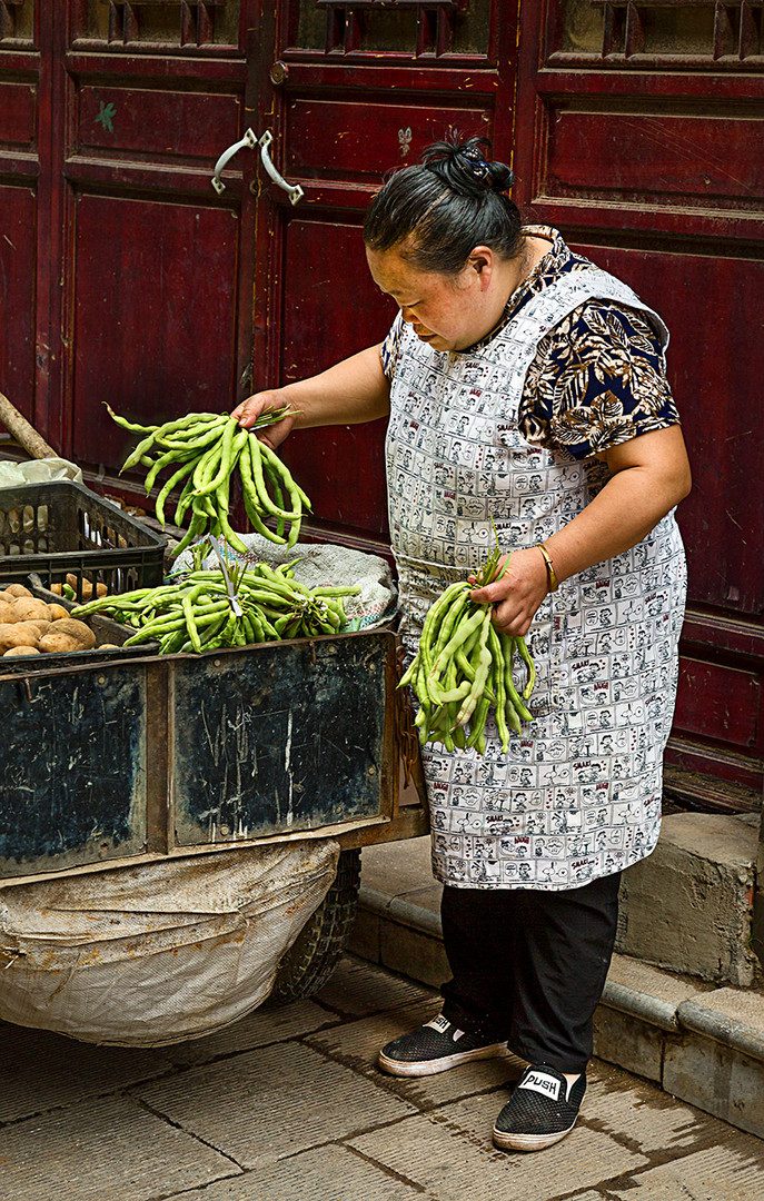 Gemüsehändlerin in Yunnan