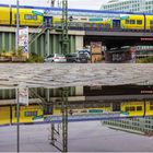 Gespiegelt ... Oberhafenbrücke Hamburg, mit Regionalzug METRONOME ...