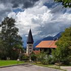 Gewitterstimmung über der evangelisch-reformierten Kirche in Meiringen