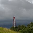 Gewitterwolken am Leuchtturm Campen in Ostfriesland