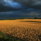 Gewitterwolken und Sonne über der Heuneburg