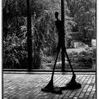 Giacometti´s "Homme qui marche", before window and lake