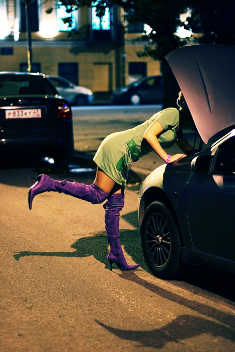 Girl and broken car