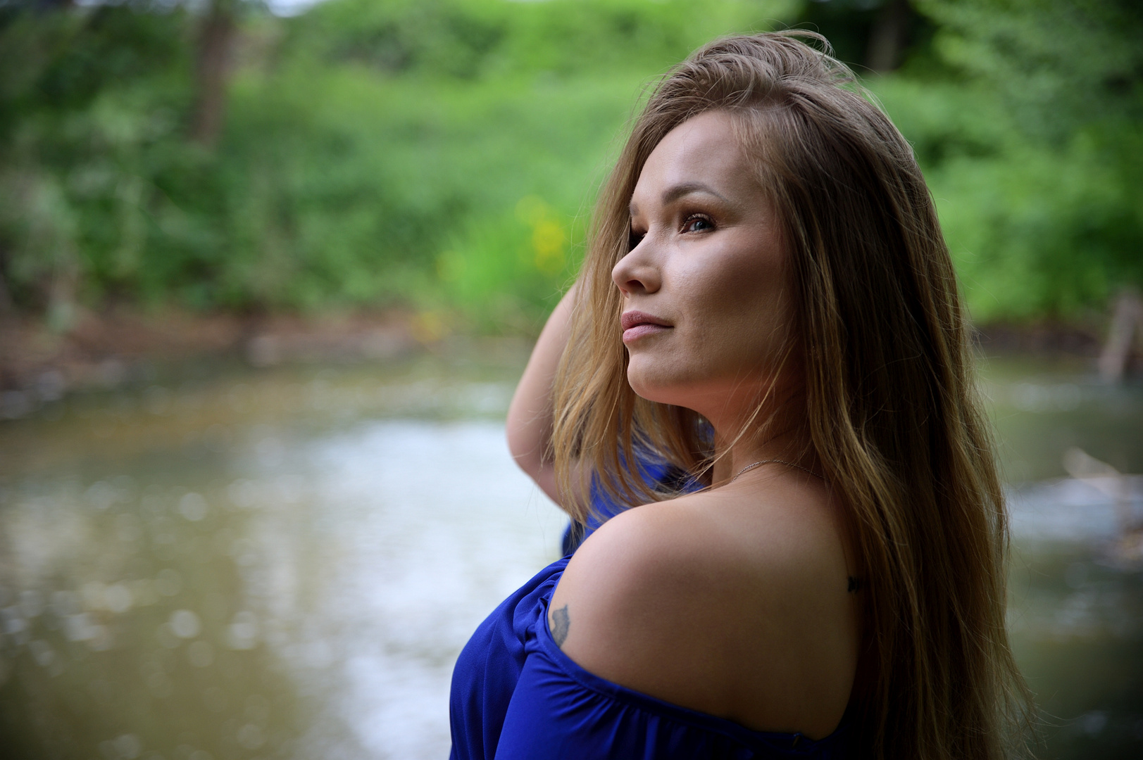 Girl at the pond