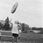 girl catching giant donut, 1978