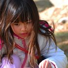 girl feeding a dove