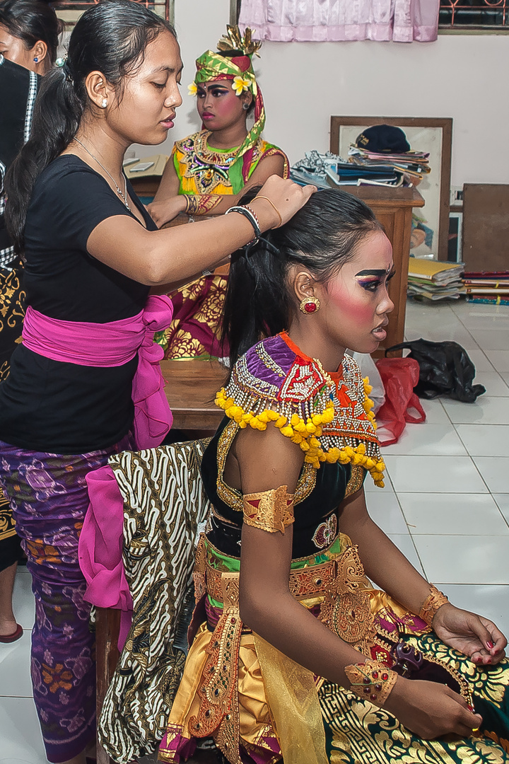 Girl gets dressed for her performance