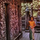 Girl in her traditionell longyi in Shwenandaw Kyaung Temple