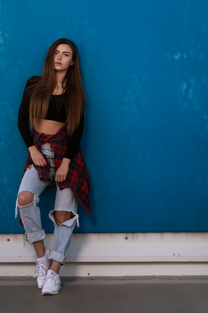 Girl in ripped jeans