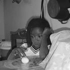 girl playing with egg