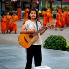 Girl plays for donation