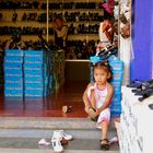 Girl Putting on Shoes