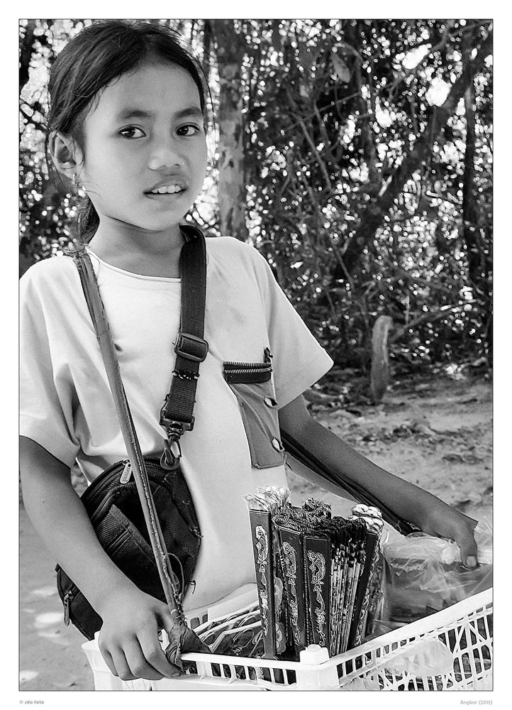 Girl selling souveniers