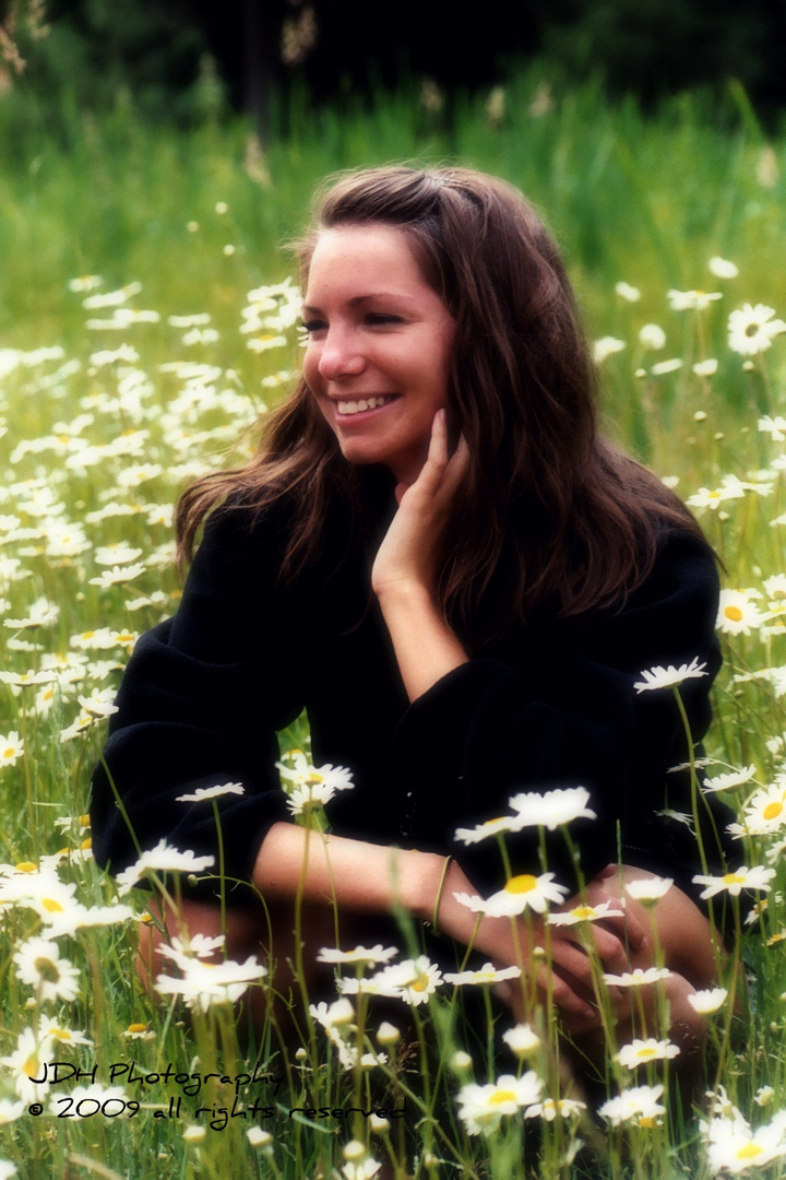 Girl Sitting Amongst Daisies