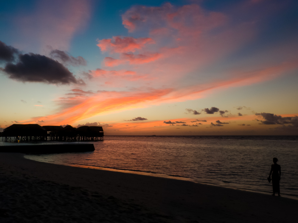 Girl staring at an amazing sunset