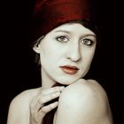 Girl with a red headscarf