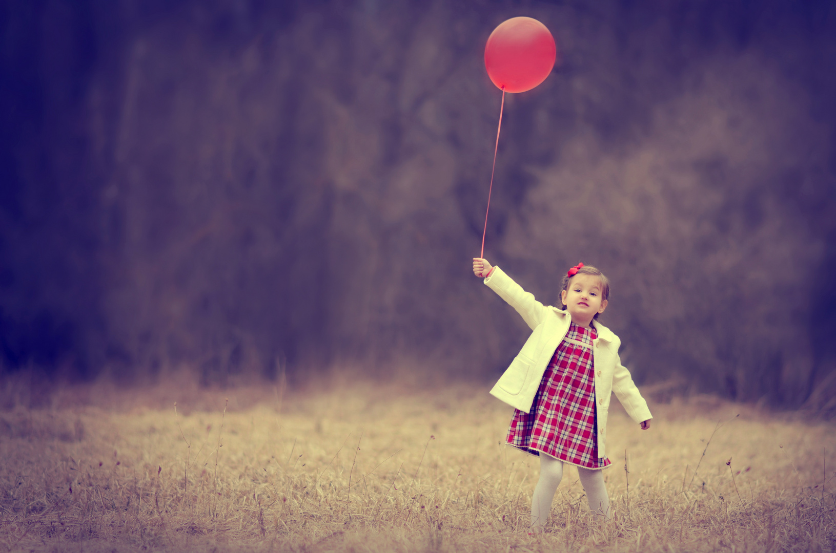 Girl with red balloon