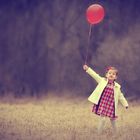 Girl with red balloon