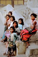 Girls at the stairways to Taung Kalat