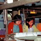 Girls working on a loom