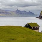 Gjógv, Wohnhaus an der Küste