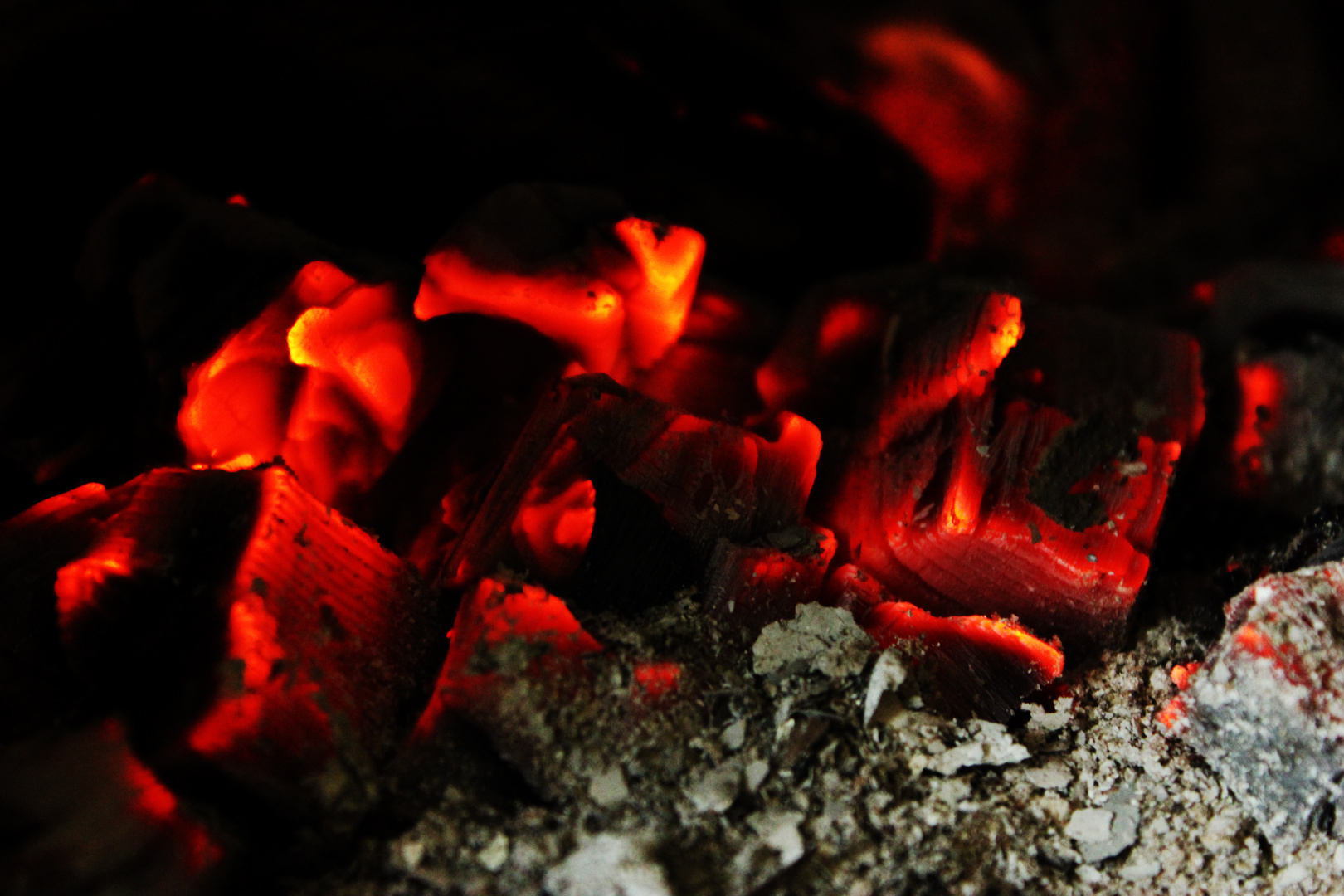 Glowing charcoal in a stove II