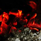 Glowing charcoal in a stove II