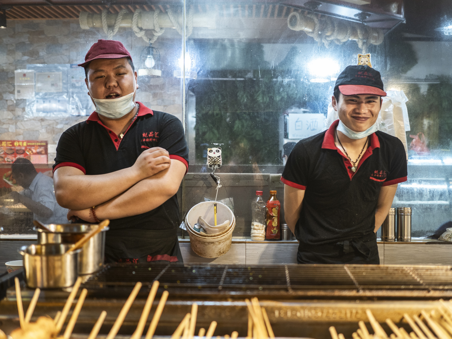 Glückliche Strassenköche in China