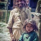 glücklicher Hindu mit Kind