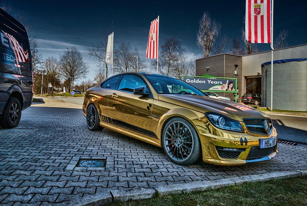 Gold Mercedes CLS63 AMG