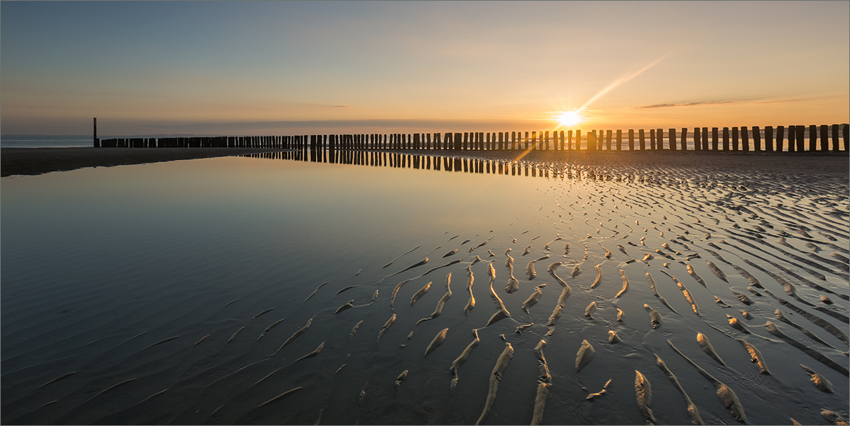 Goldener Morgen am Strand