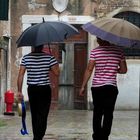 Gondoliers sous la pluie