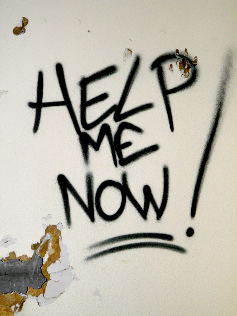 Graffiti "Help me now"