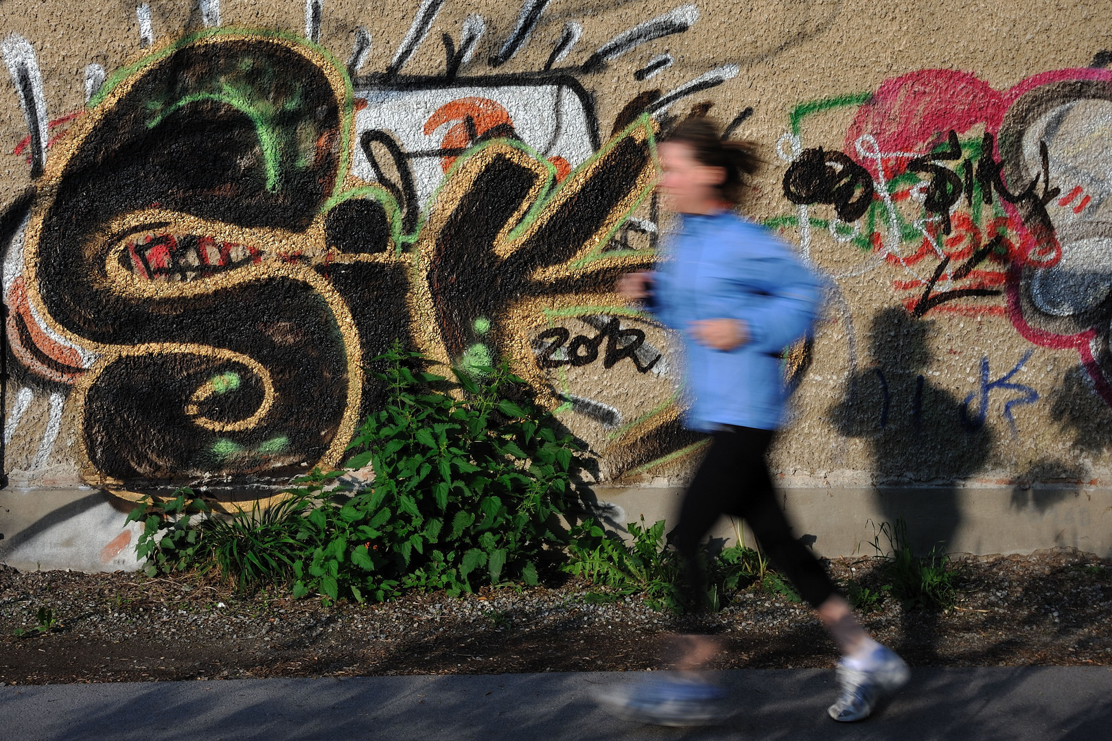 Graffiti und Läufer