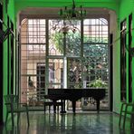 Grand Piano in a green room