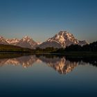 Grand Teton Bergkette im Spiegelbild beimSonnenaufgang