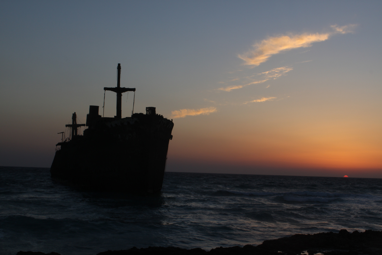 greek ship on sunrise