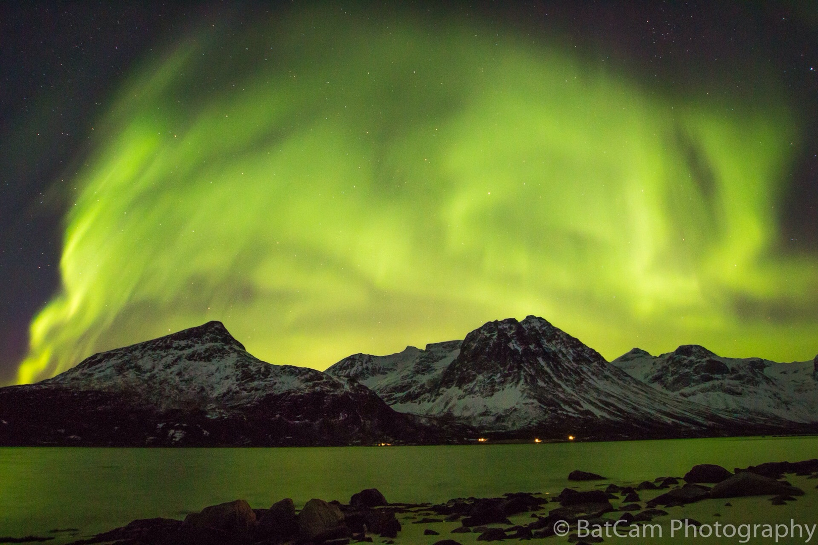 Green burning night sky