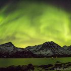 Green burning night sky