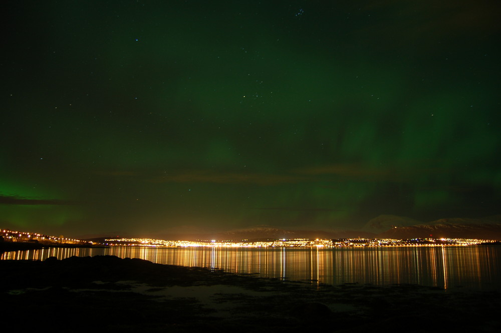 green clouds over tromsø