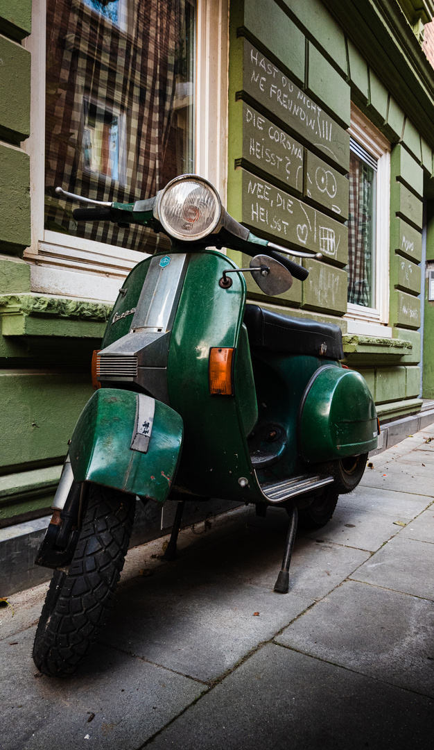 green-vespa-green-wall