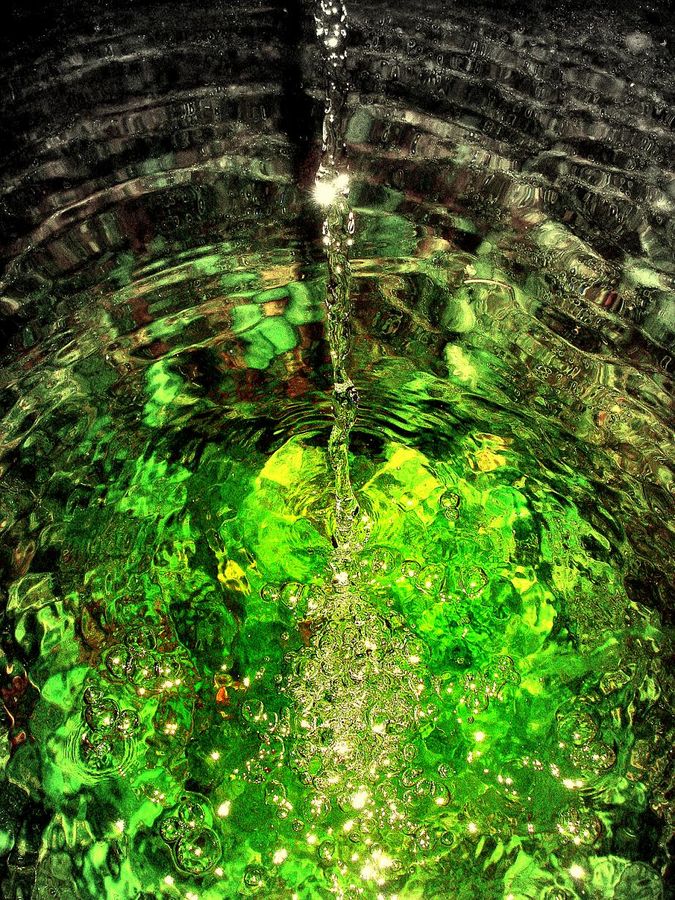 green water in rosty tub