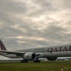 Grey Jetliner below grey Sky