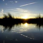 große Sonne in kleinem Wasser