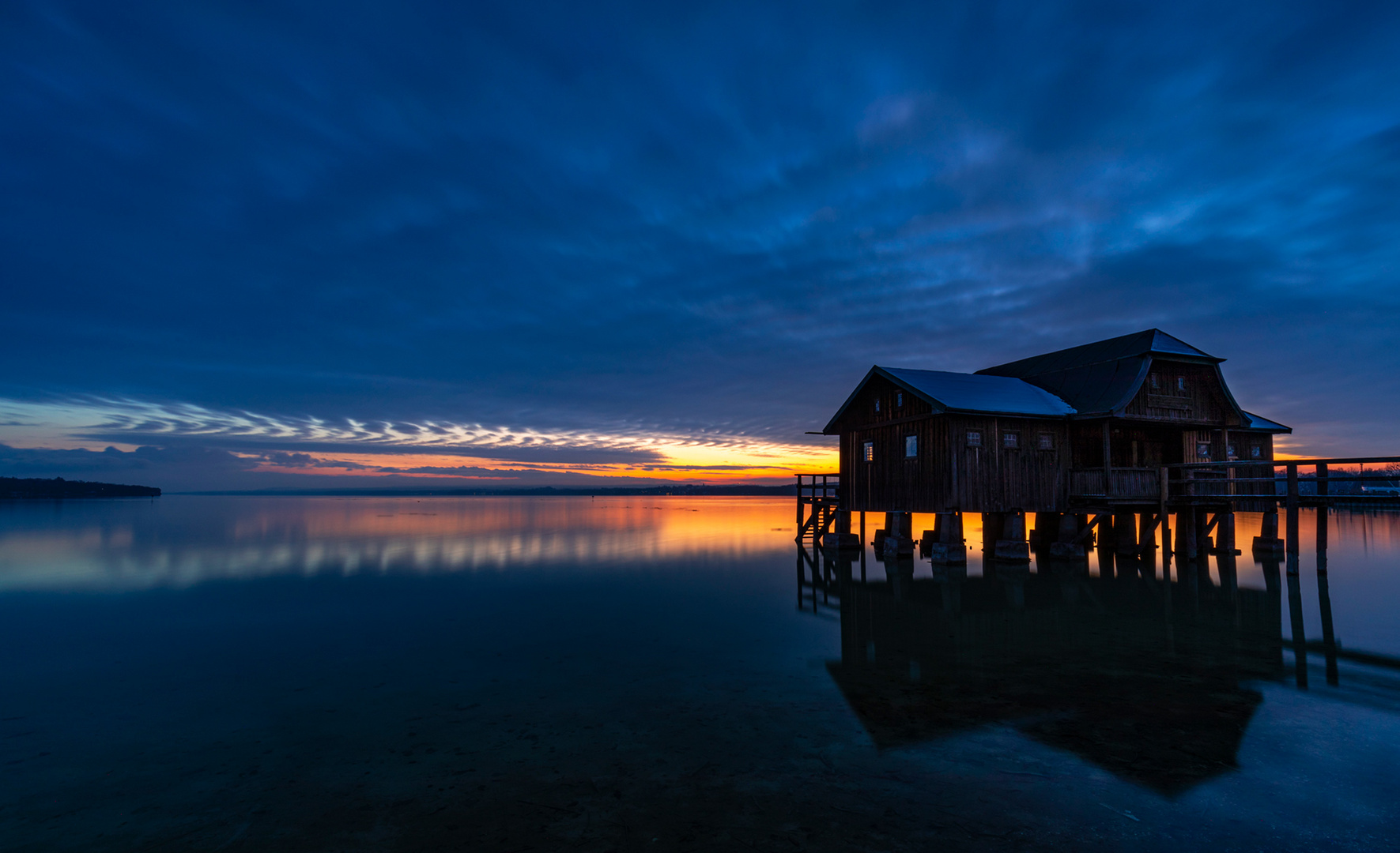 Großes_Bootshaus_Stegen_Sonnenuntergang-WB