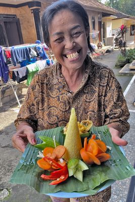 Gung Gek giving me the present