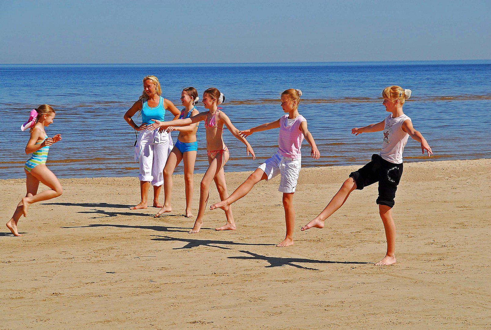 Gymnastikunterricht am Strand